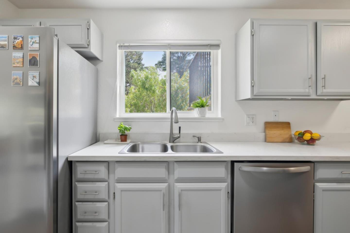 46 Shepherds Knoll Road Pebble Beach, CA 93953 - Photo 19 of 41 a kitchen with stainless steel appliances granite countertop a sink and a cabinets