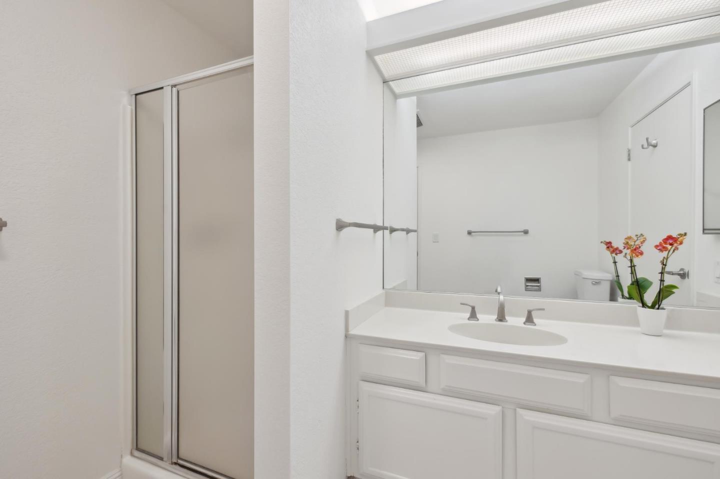 46 Shepherds Knoll Road Pebble Beach, CA 93953 - Photo 29 of 41 a bathroom with a sink and a mirror