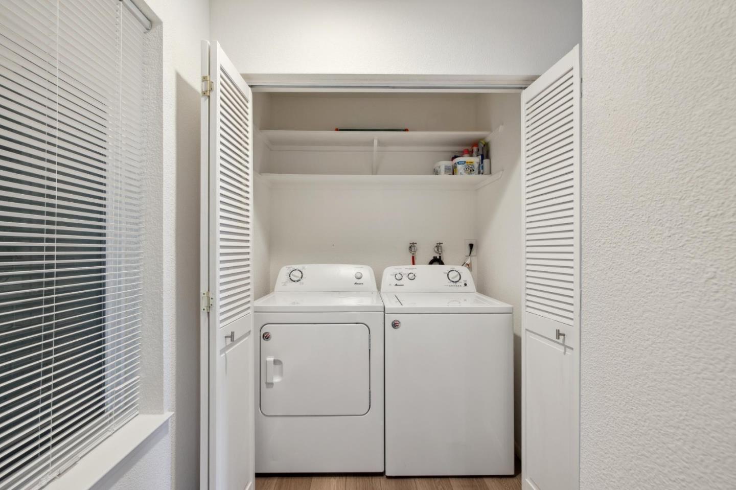 46 Shepherds Knoll Road Pebble Beach, CA 93953 - Photo 33 of 41 a utility room with dryer and washer