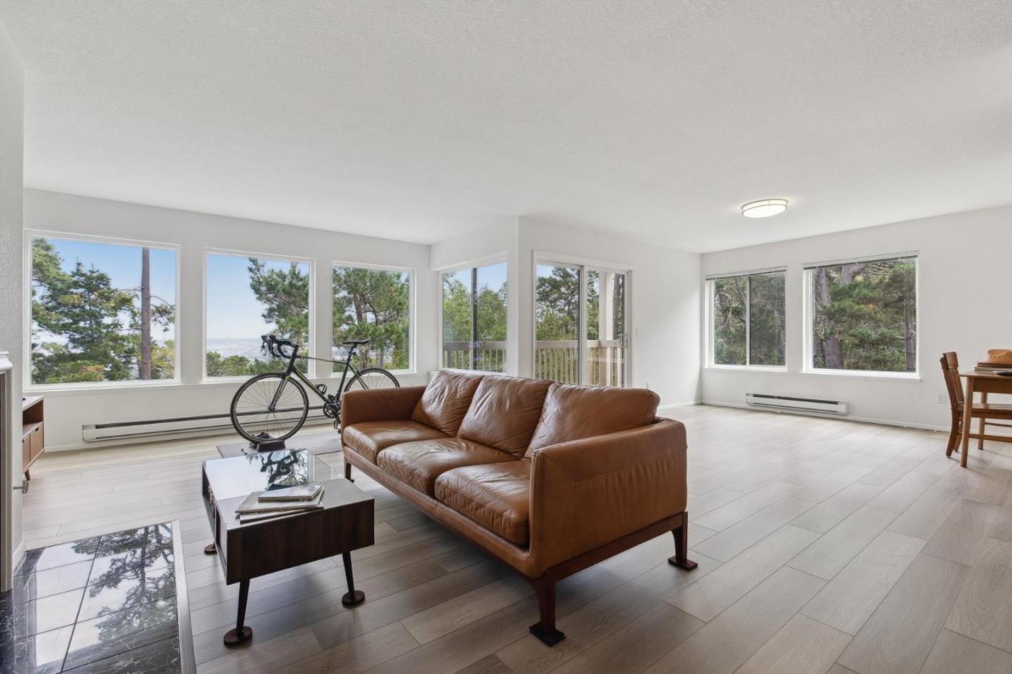46 Shepherds Knoll Road Pebble Beach, CA 93953 - Photo 4 of 41 a living room with furniture and a large window