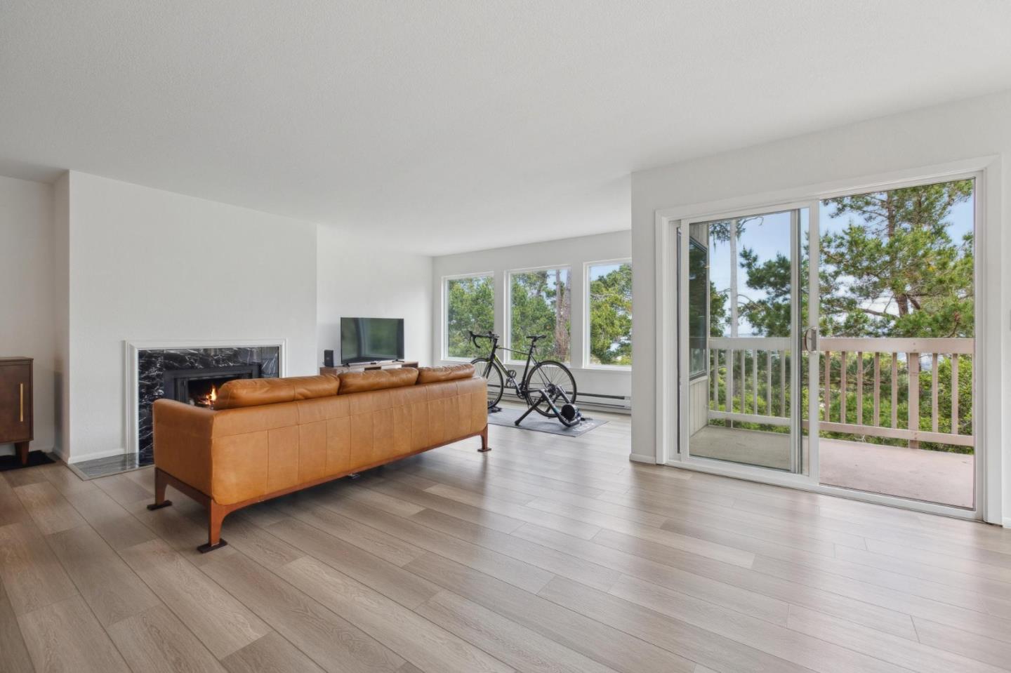 46 Shepherds Knoll Road Pebble Beach, CA 93953 - Photo 6 of 41 a living room with furniture and large windows