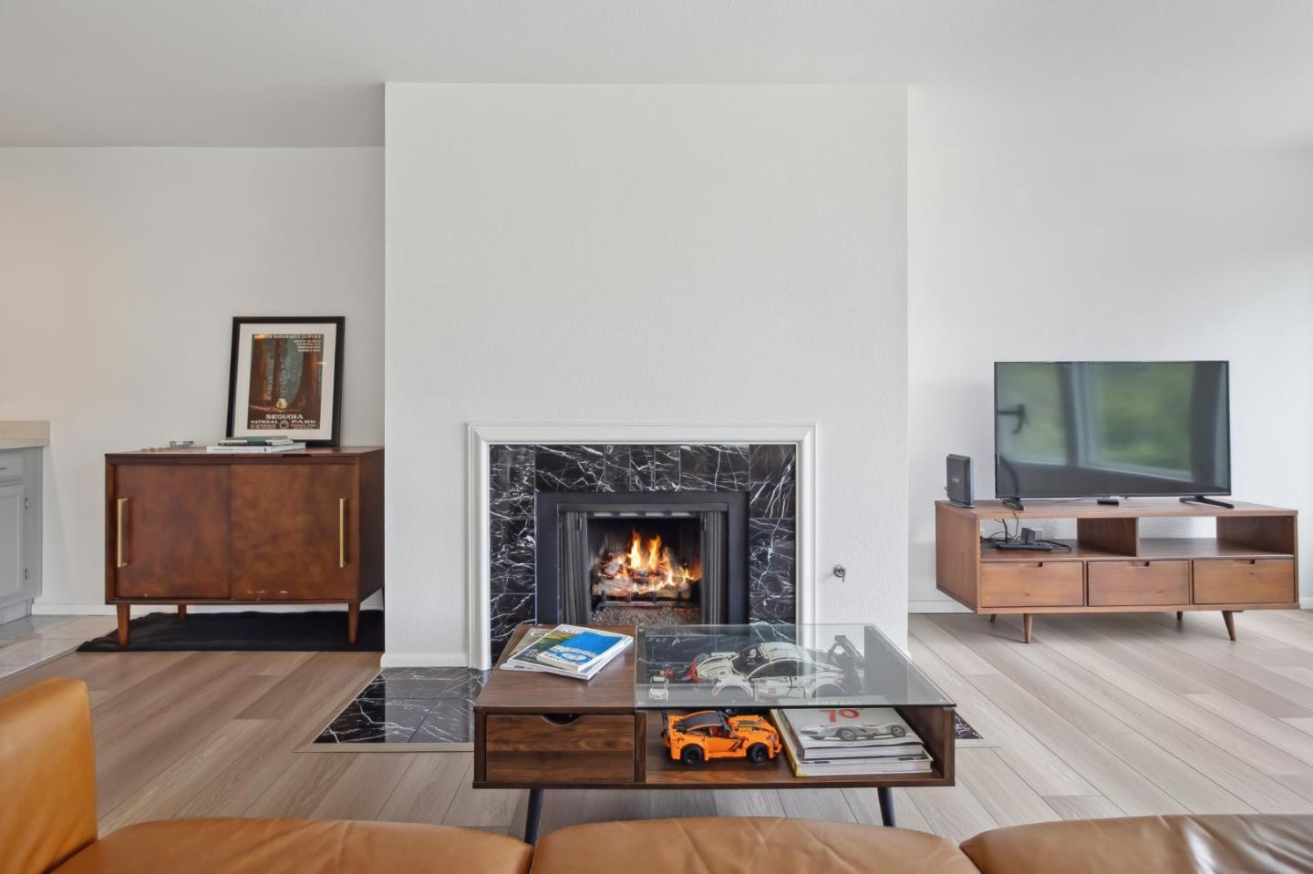 46 Shepherds Knoll Road Pebble Beach, CA 93953 - Photo 9 of 41 a living room with furniture and a fireplace