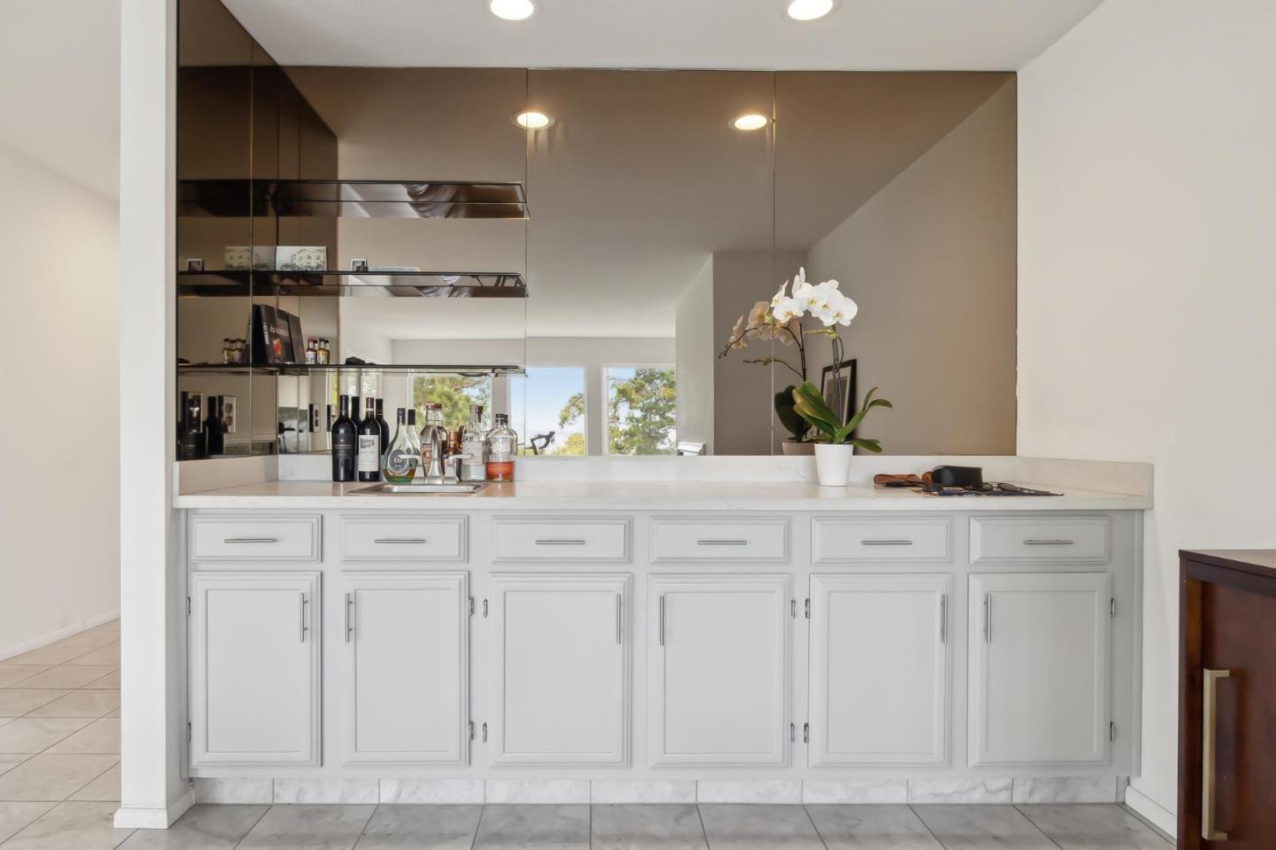 46 Shepherds Knoll Road Pebble Beach, CA 93953 - Photo 10 of 41 a kitchen with white cabinets