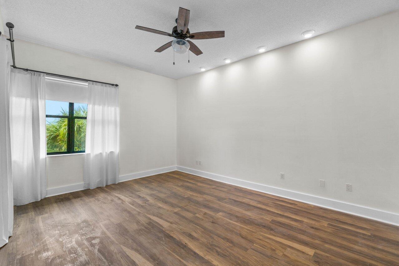 7460 La Paz Boulevard, Unit 305 Boca Raton, FL 33433 - Photo 12 of 36 Primary Bedroom