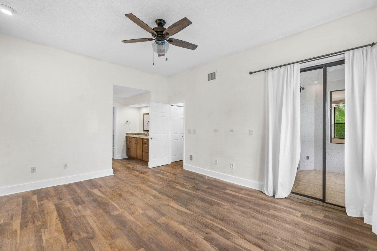 7460 La Paz Boulevard, Unit 305 Boca Raton, FL 33433 - Photo 13 of 36 Primary Bedroom
