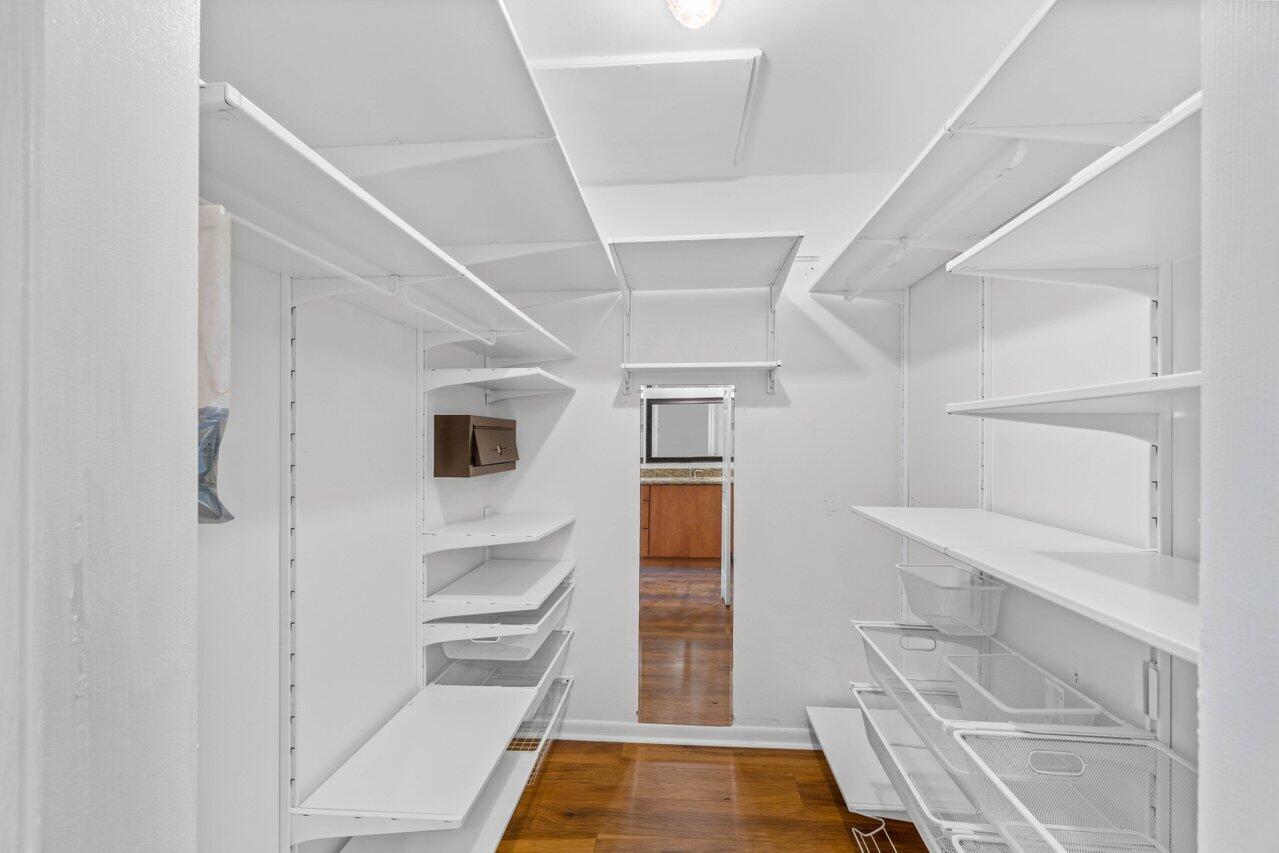 7460 La Paz Boulevard, Unit 305 Boca Raton, FL 33433 - Photo 14 of 36 Primary Walk-In Closet