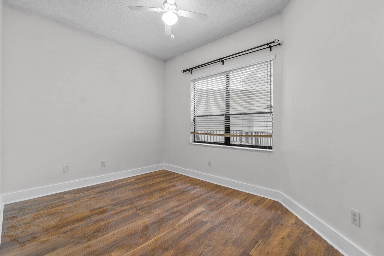 7460 La Paz Boulevard, Unit 305 Boca Raton, FL 33433 - Photo 19 of 36 Guest Bedroom