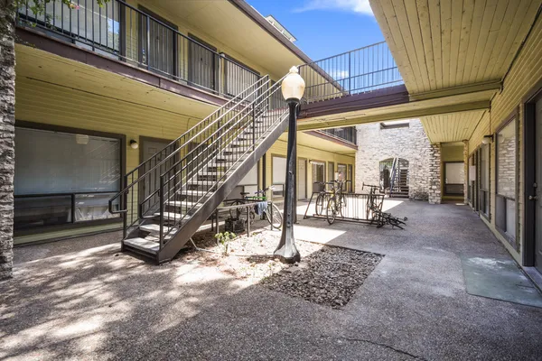 a view of a building with a porch
