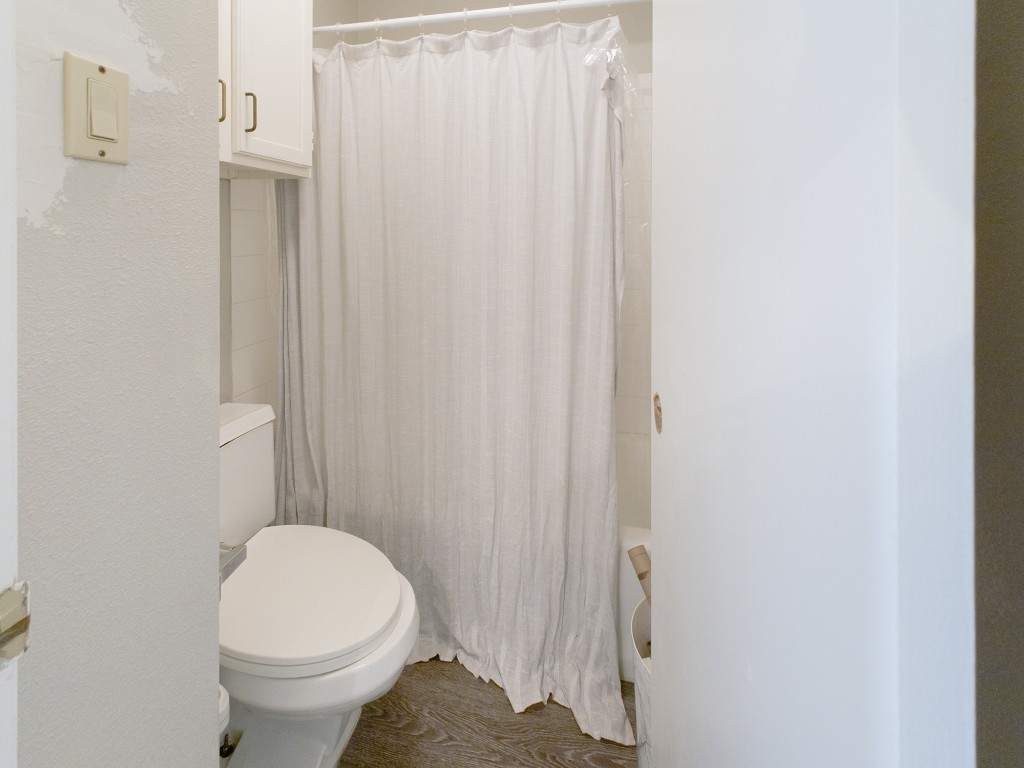 2815 Rio Grande Street, Unit 101 Austin, TX 78705 - Photo 4 of 15 a bathroom with a sink and a toilet