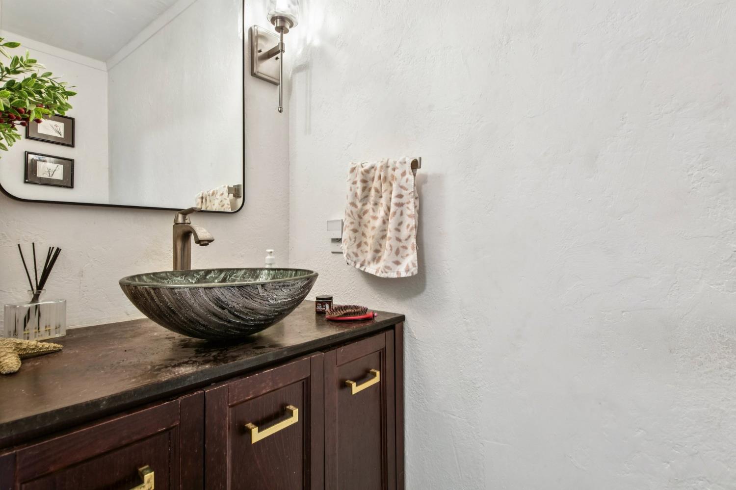 3571 Sudbury Road Cameron Park, CA 95682 - Photo 23 of 87 Half bath in Upstairs Laundry Room