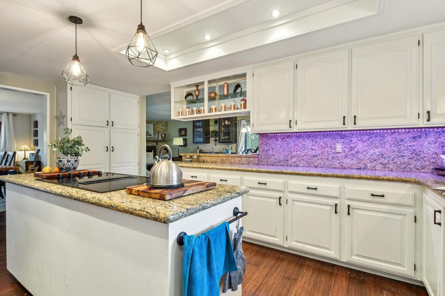 3571 Sudbury Road Cameron Park, CA 95682 - Photo 8 of 87 Kitchen Lights are NOT Purple. Its a refection. Area is bright and warming