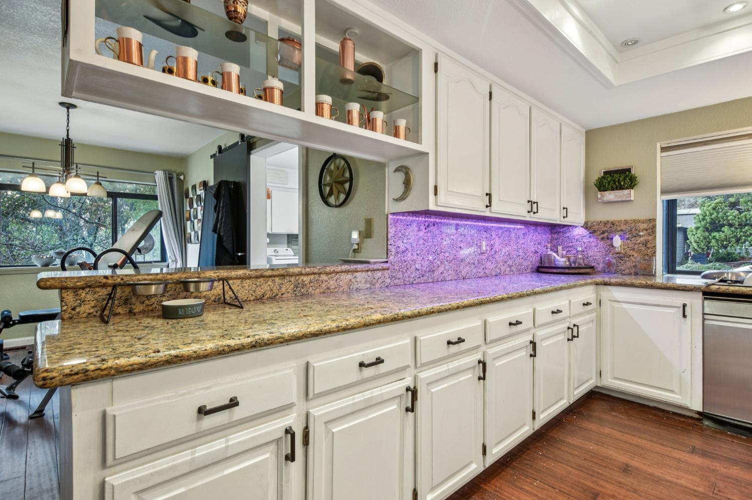 3571 Sudbury Road Cameron Park, CA 95682 - Photo 9 of 87 Kitchen Lights are NOT Purple. Its a refection. Area is bright and warming