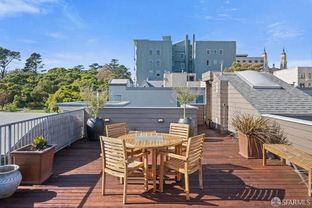 a view of a terrace with seating space