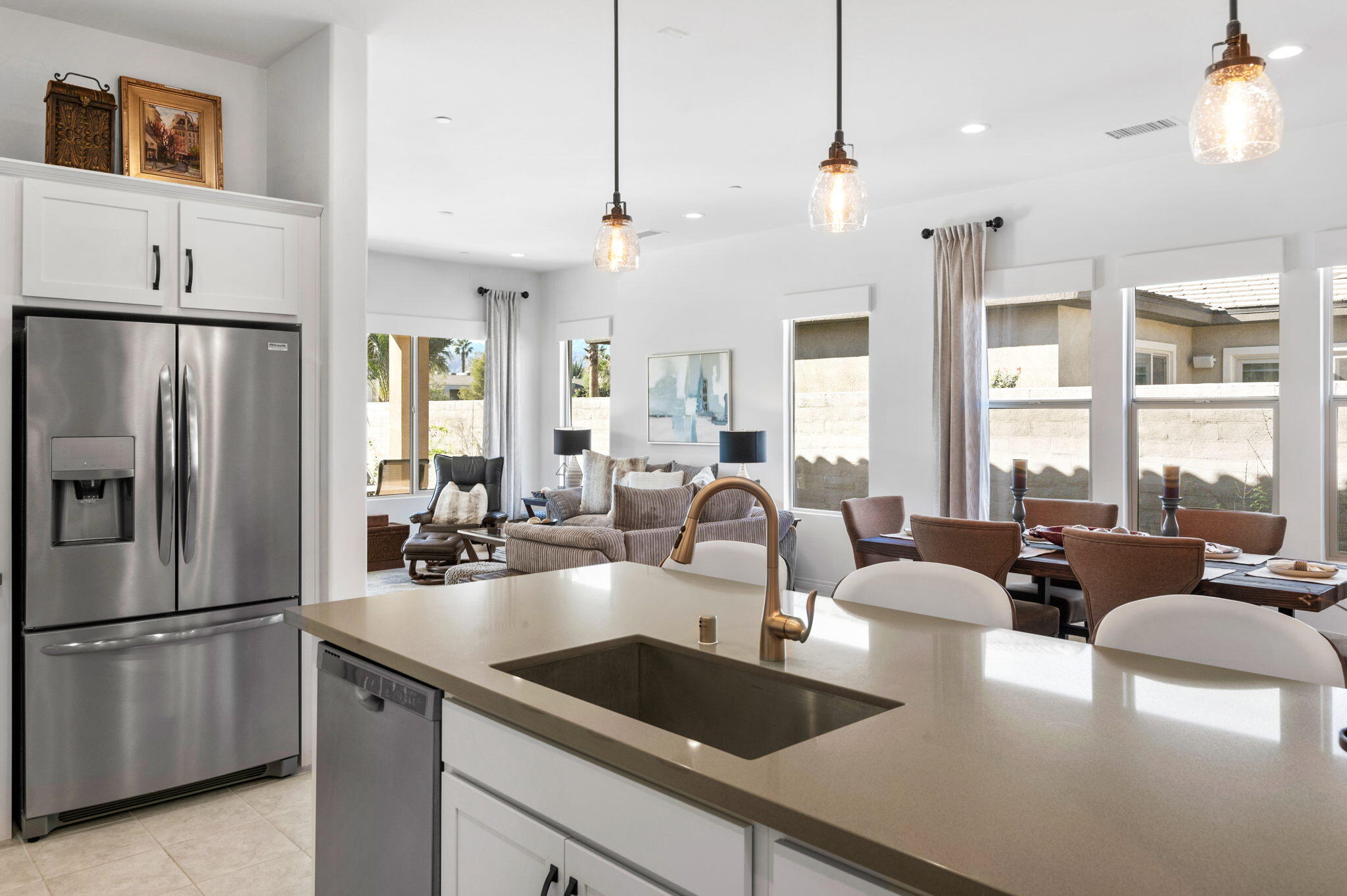 67 Cabernet Rancho Mirage, CA 92270 - Photo 12 of 41 a kitchen with stainless steel appliances granite countertop a sink a stove and a refrigerator