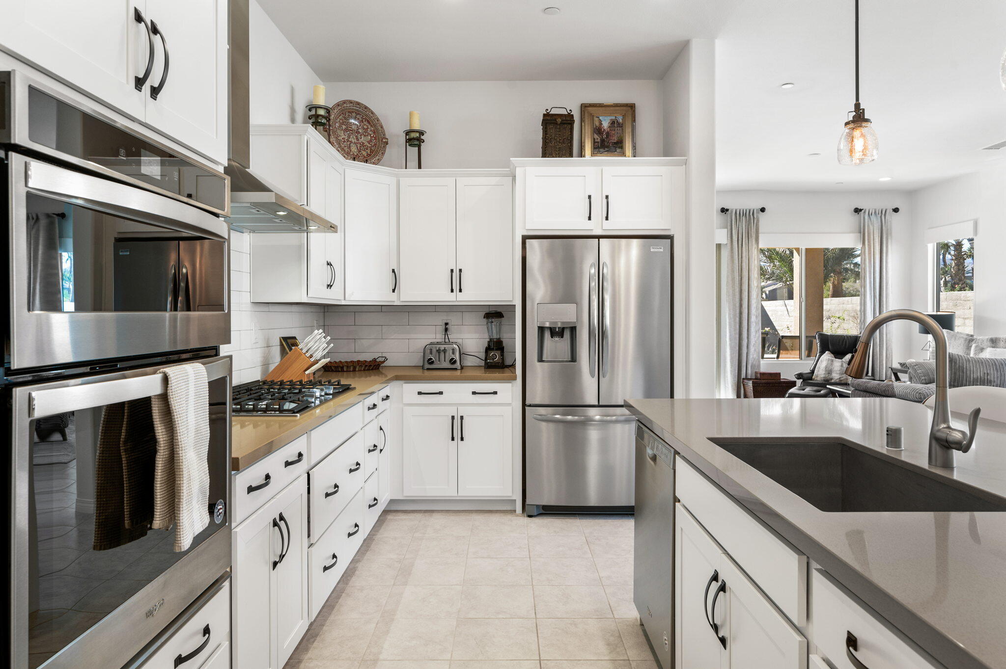 67 Cabernet Rancho Mirage, CA 92270 - Photo 13 of 41 a kitchen with granite countertop a refrigerator sink and stove