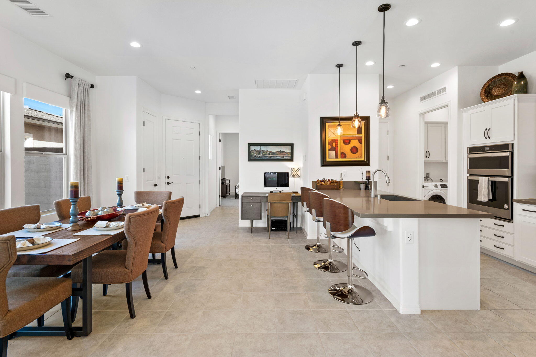 67 Cabernet Rancho Mirage, CA 92270 - Photo 15 of 41 a living room with furniture kitchen view and a large window