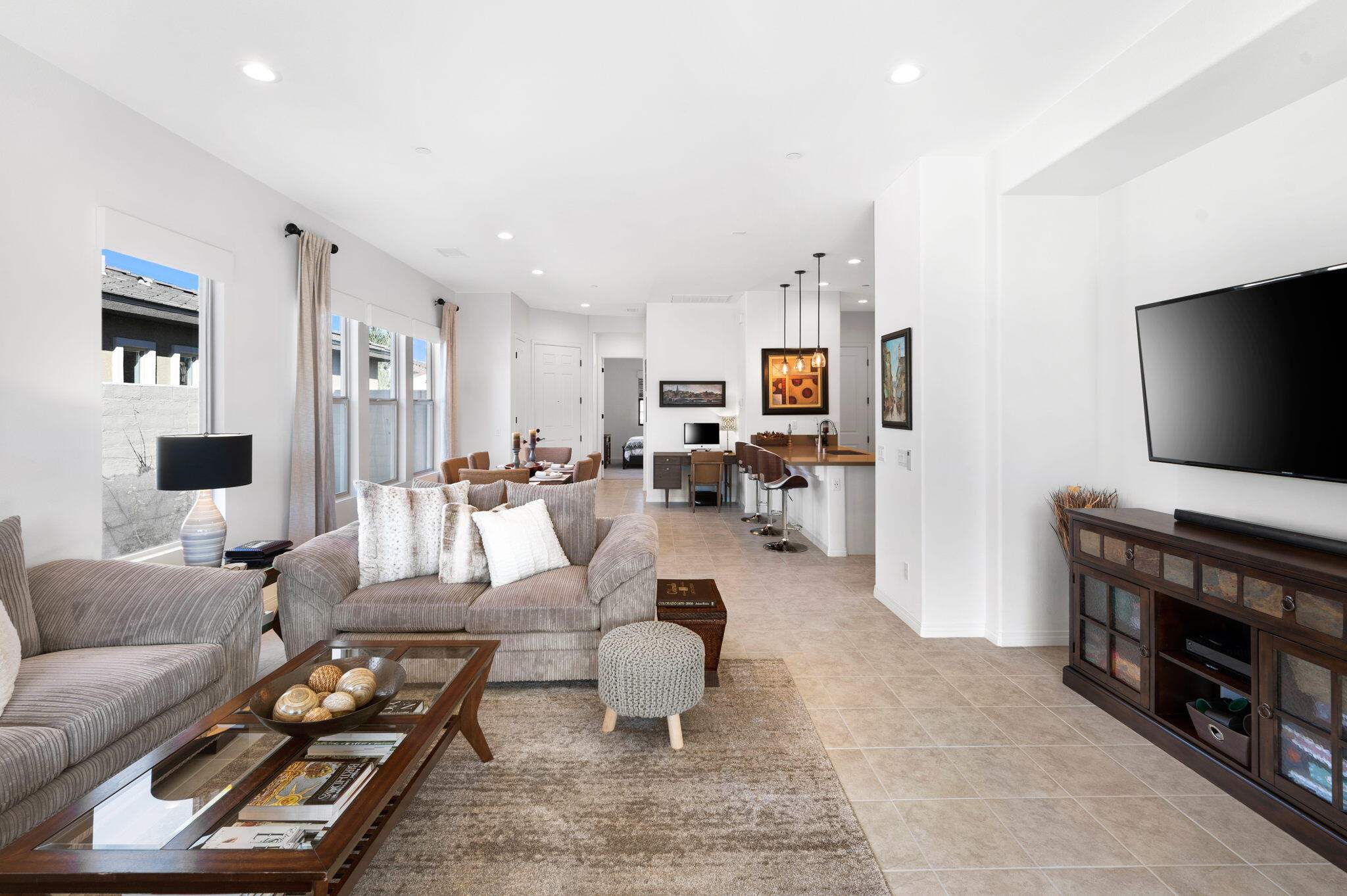 67 Cabernet Rancho Mirage, CA 92270 - Photo 17 of 41 a living room with furniture and a flat screen tv