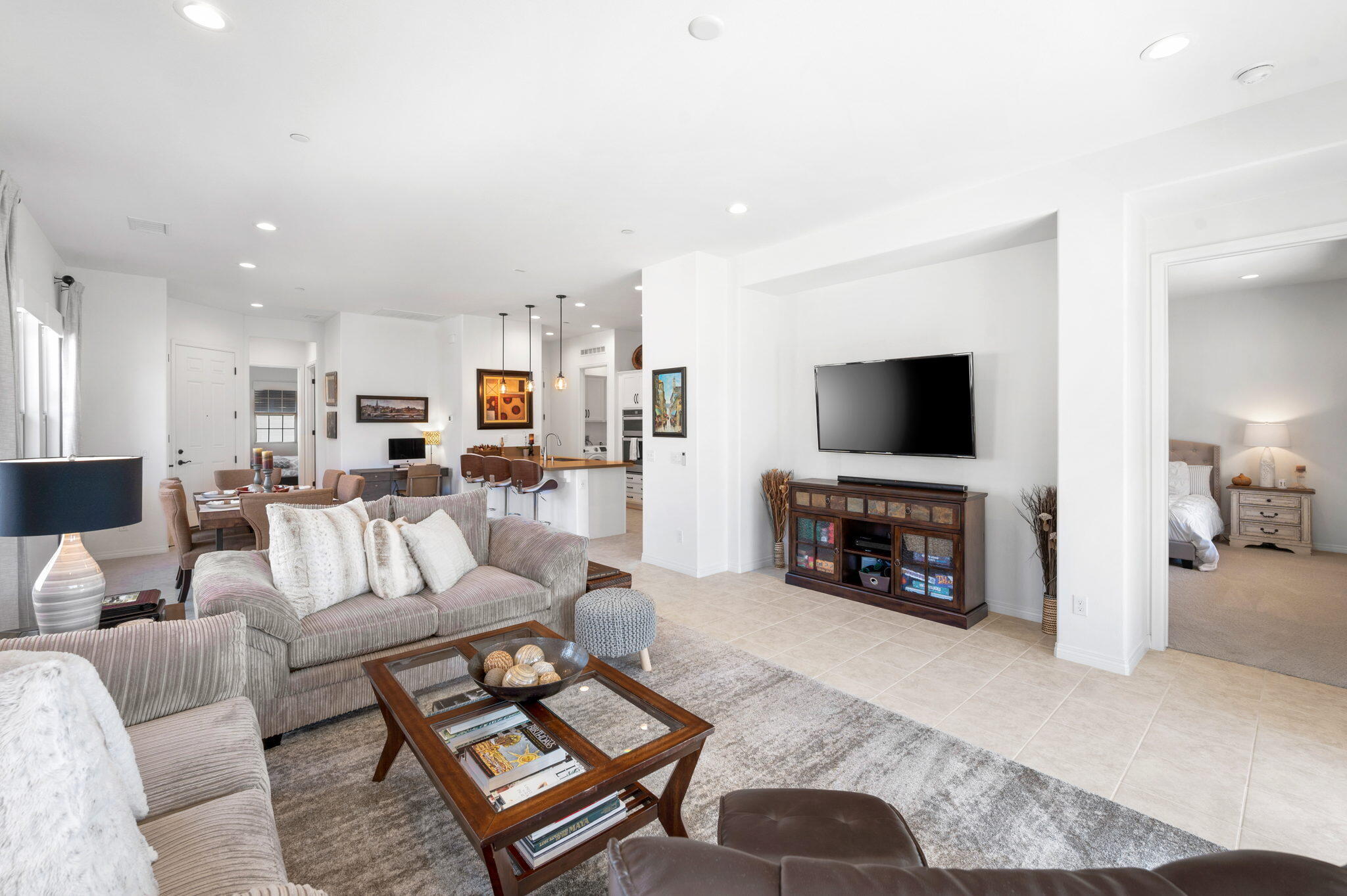 67 Cabernet Rancho Mirage, CA 92270 - Photo 18 of 41 a living room with furniture and a flat screen tv