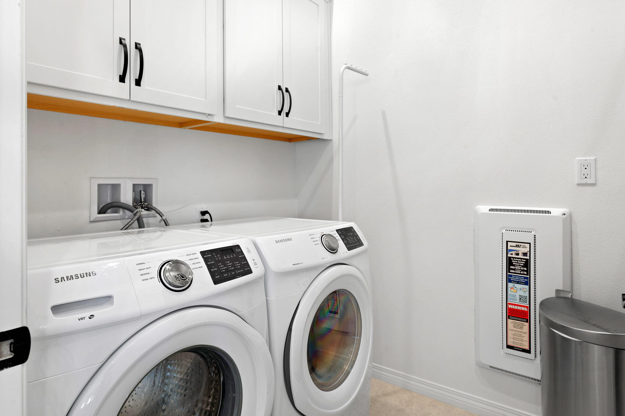 67 Cabernet Rancho Mirage, CA 92270 - Photo 19 of 41 a utility room with dryer and washer