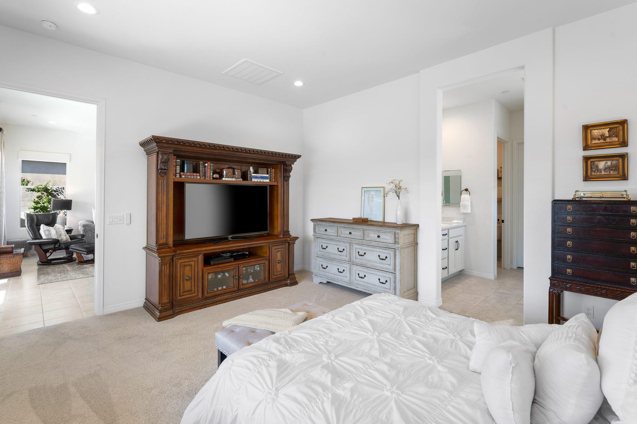 67 Cabernet Rancho Mirage, CA 92270 - Photo 21 of 41 a bedroom with a bed and flat screen tv