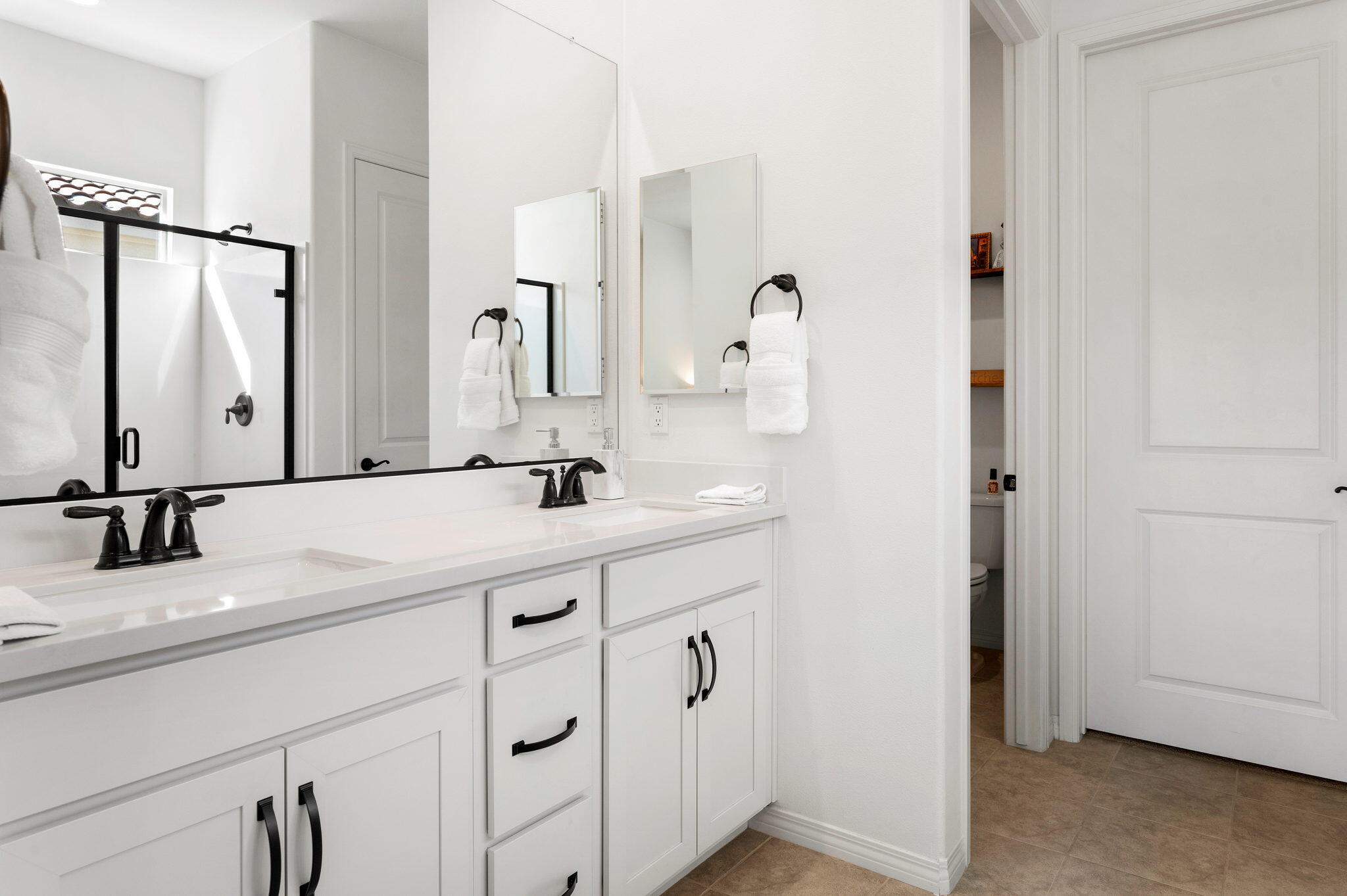 67 Cabernet Rancho Mirage, CA 92270 - Photo 23 of 41 a bathroom with a double vanity sink mirror and double