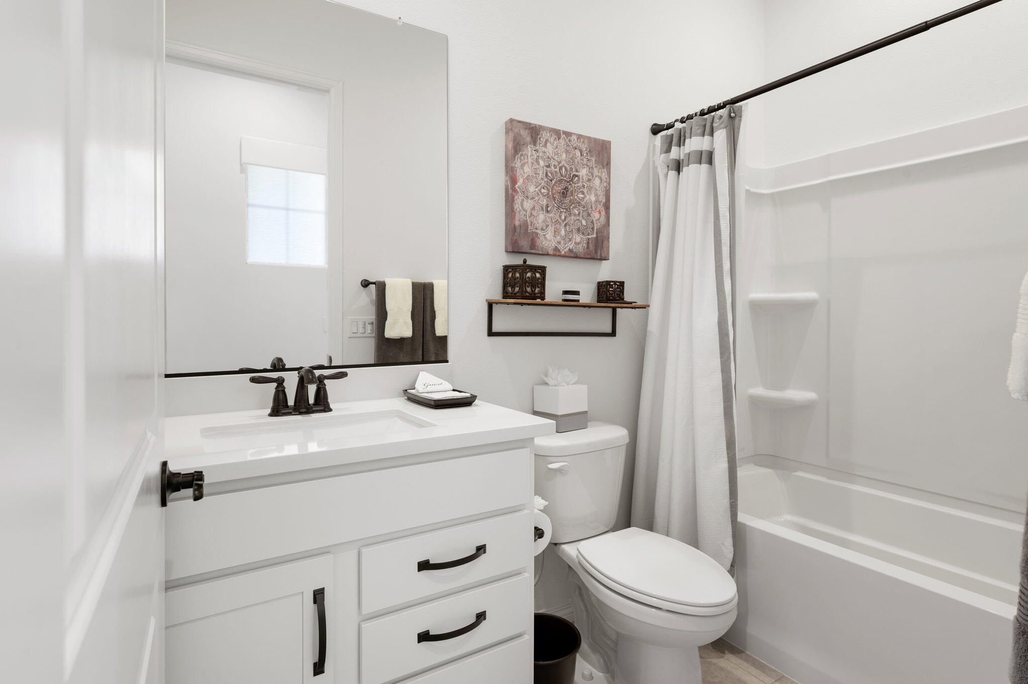 67 Cabernet Rancho Mirage, CA 92270 - Photo 26 of 41 a bathroom with a sink toilet vanity and tub