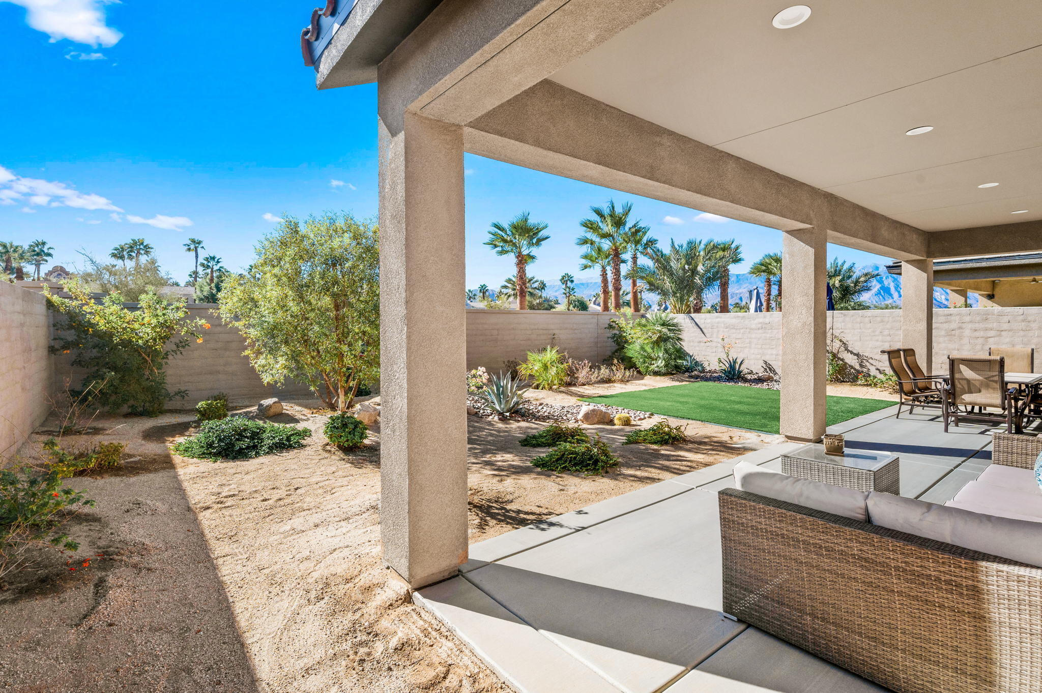 67 Cabernet Rancho Mirage, CA 92270 - Photo 29 of 41 a view of a porch with furniture and garden