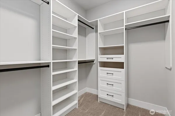 a view of an empty walk in closet
