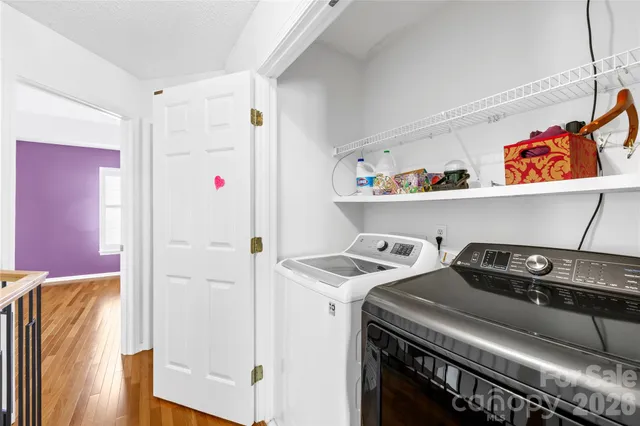 a balcony with furniture and a window