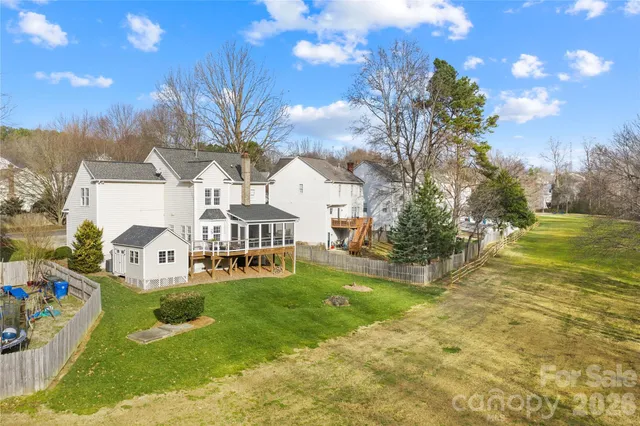 a view of a big yard with palm trees and a big yard