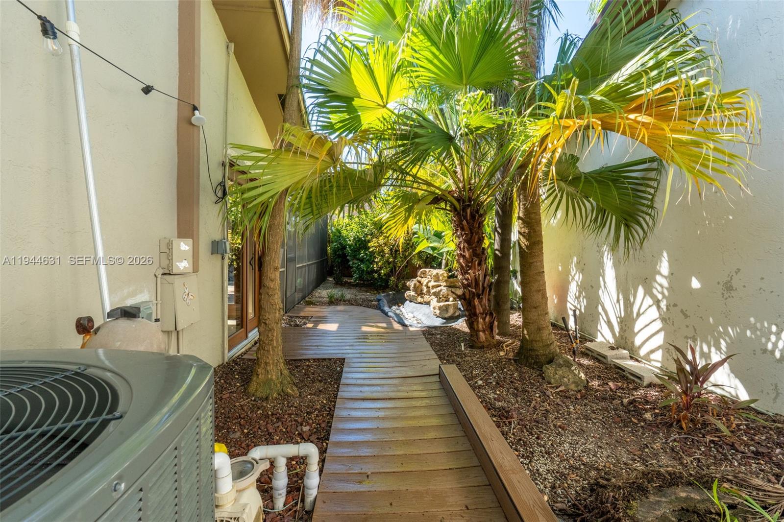 10116 Southwest 144th Place Miami, FL 33186 - Photo 23 of 28 a view of a backyard