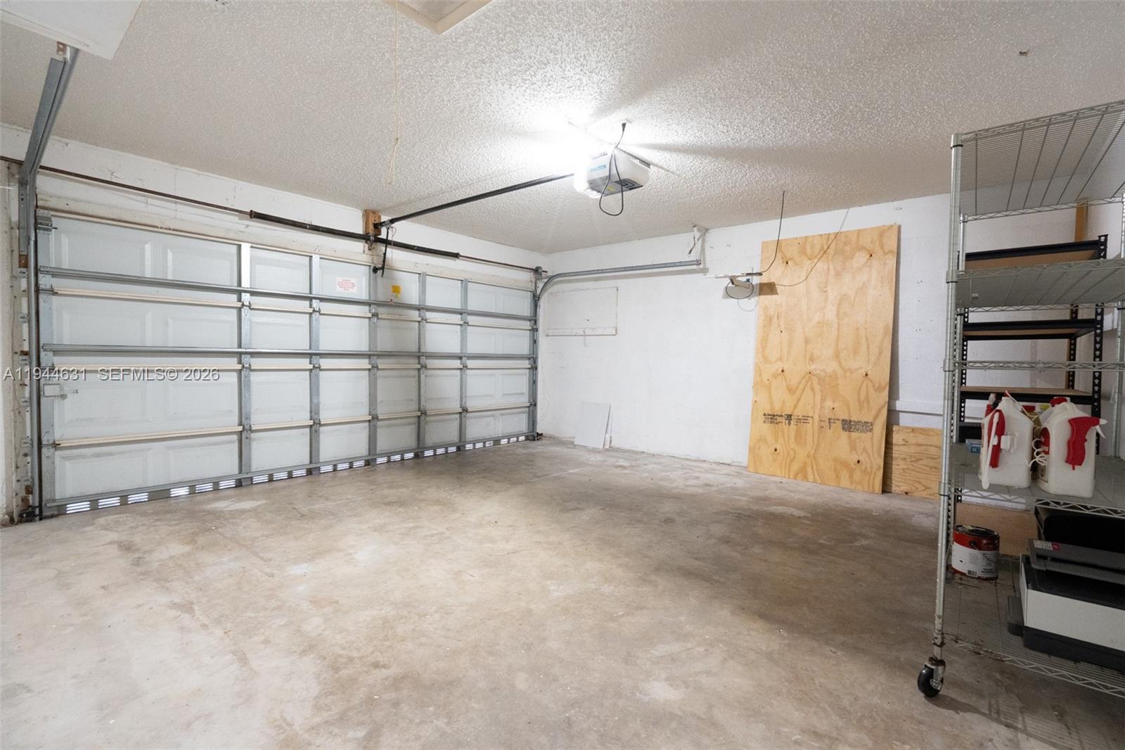 10116 Southwest 144th Place Miami, FL 33186 - Photo 27 of 28 a view of a garage