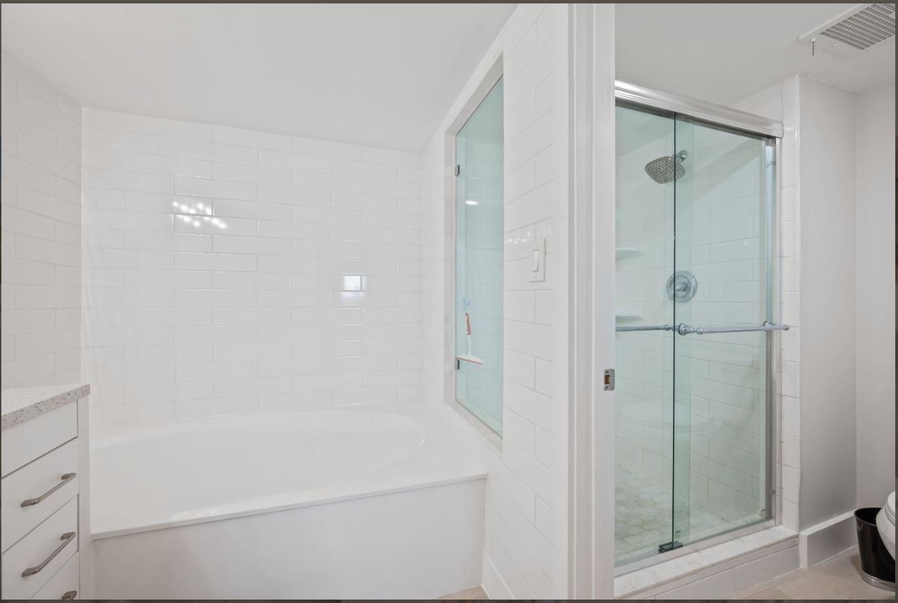 500 Ocean Trail Way, Unit 506 Jupiter, FL 33477 - Photo 19 of 28 a bathroom with a shower