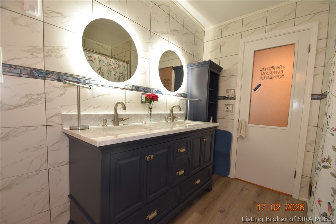 1905 Blackiston Mill Road Clarksville, IN 47129 - Photo 39 of 64 2nd floor bathroom. Double sink vanity and lighted mirrors.