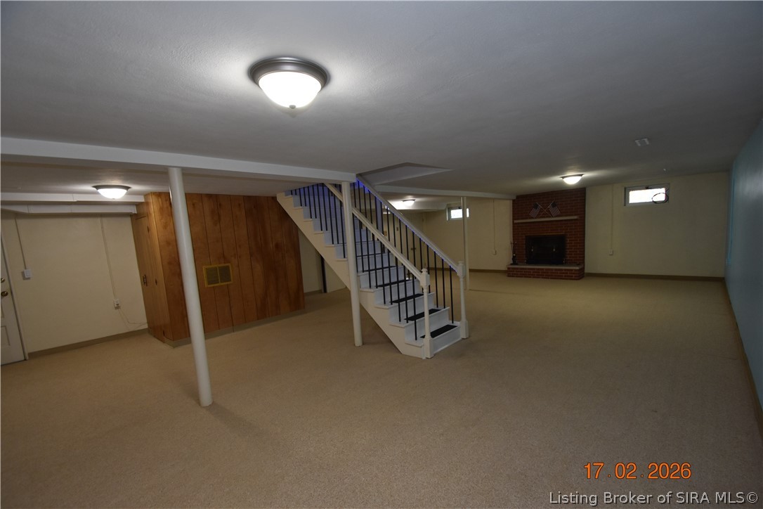 1905 Blackiston Mill Road Clarksville, IN 47129 - Photo 42 of 64 Basement has carpet and plenty of lighting.