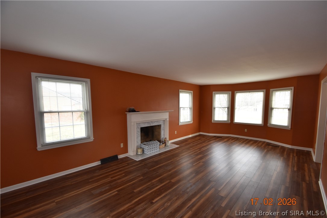 1905 Blackiston Mill Road Clarksville, IN 47129 - Photo 6 of 64 Living room with fireplace and bay window.