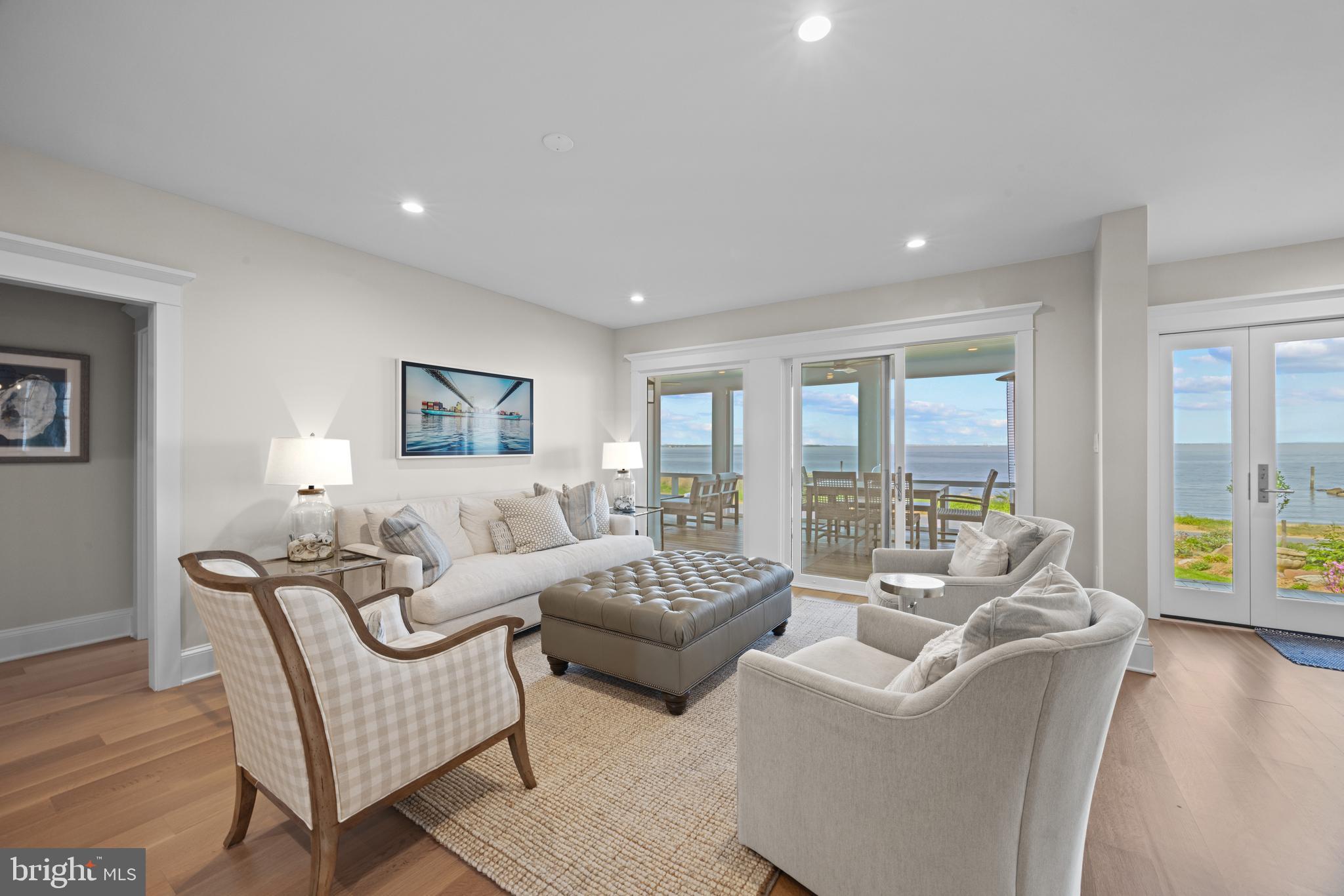 54 River Drive Annapolis, MD 21403 - Photo 12 of 43 a living room with furniture and a large window