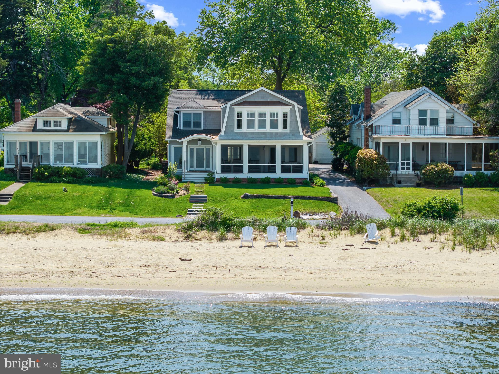 54 River Drive Annapolis, MD 21403 - Photo 2 of 43 a front view of a house with a garden