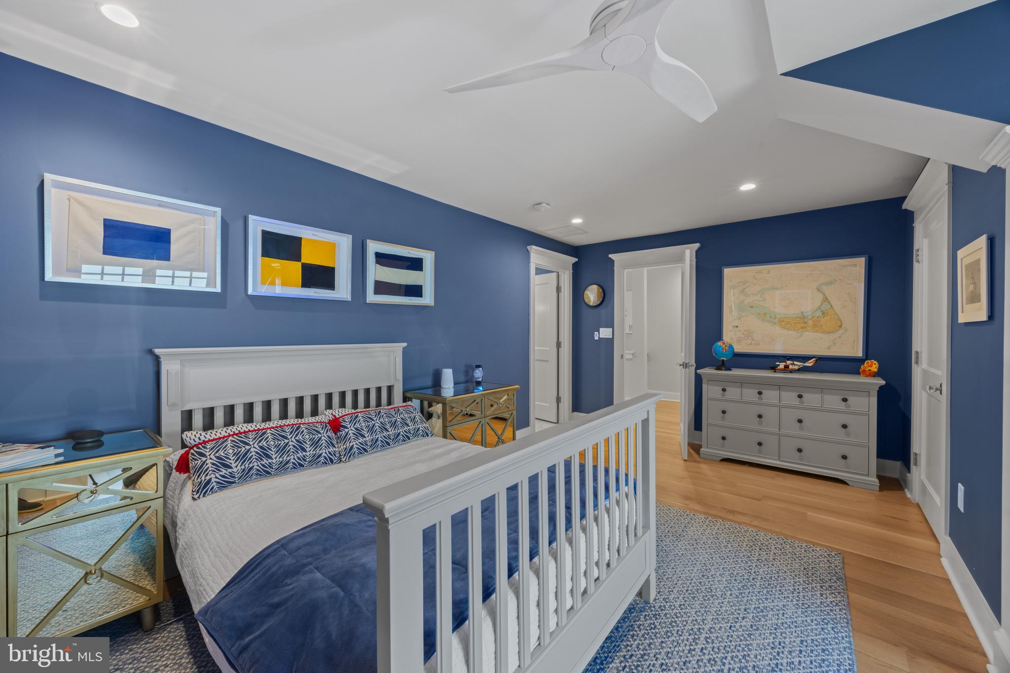 54 River Drive Annapolis, MD 21403 - Photo 26 of 43 a bedroom with furniture and a flat screen tv