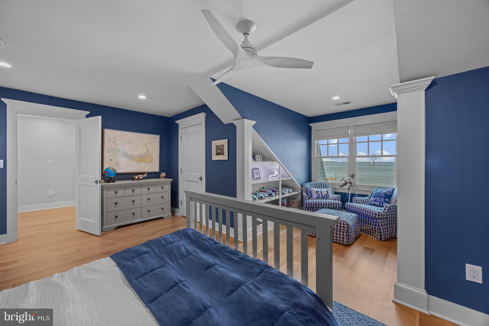 54 River Drive Annapolis, MD 21403 - Photo 27 of 43 a living room with furniture and a flat screen tv