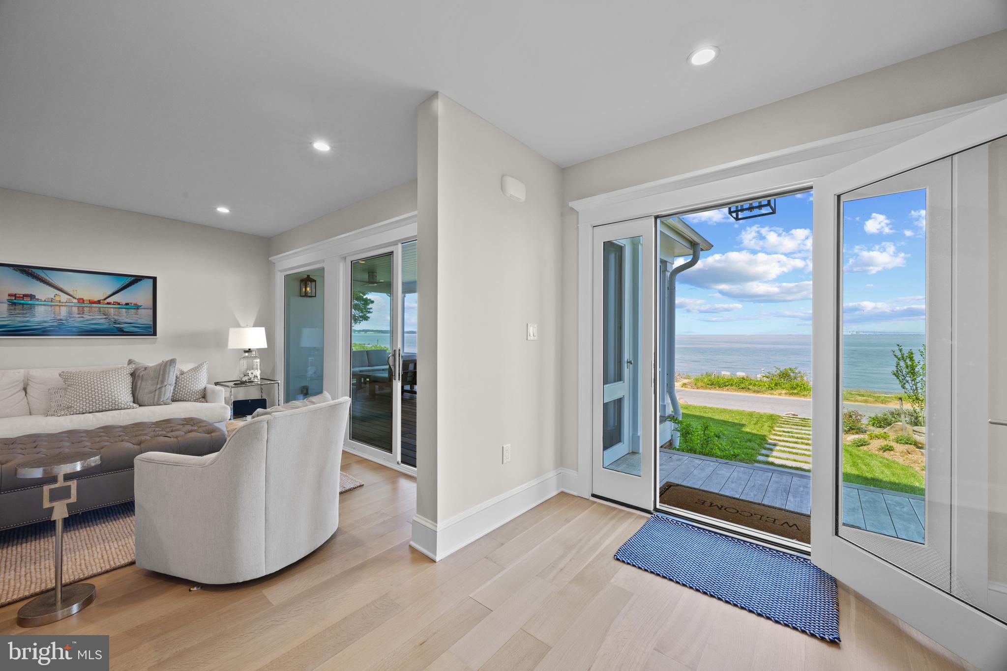 54 River Drive Annapolis, MD 21403 - Photo 5 of 43 a living room with furniture and a large window