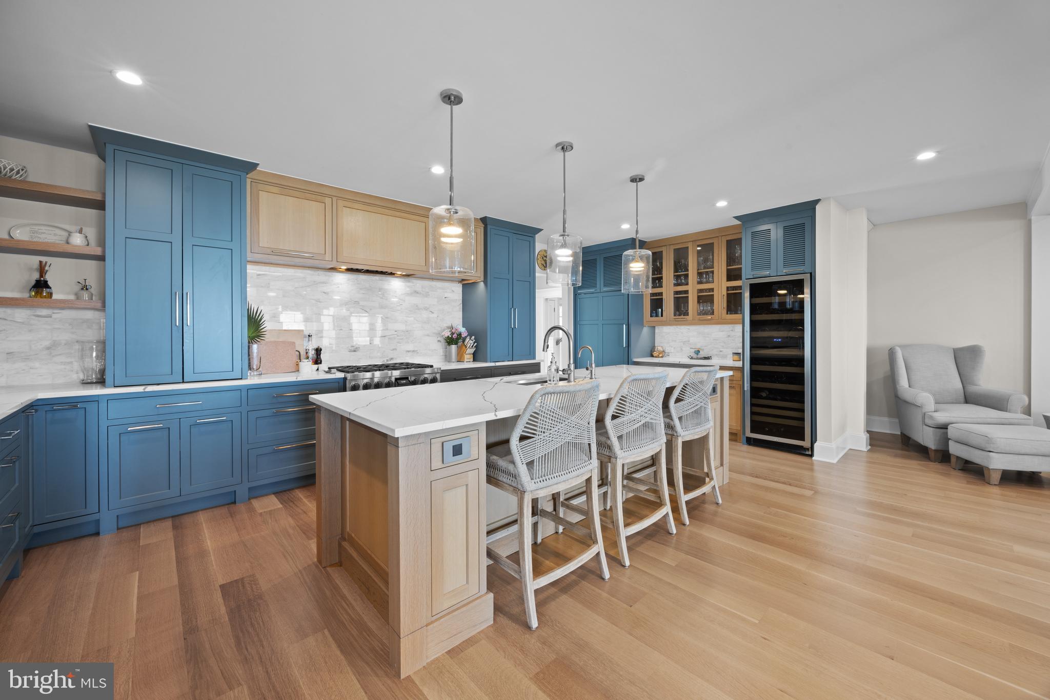 54 River Drive Annapolis, MD 21403 - Photo 8 of 43 a kitchen with stainless steel appliances kitchen island granite countertop a stove a sink and a refrigerator