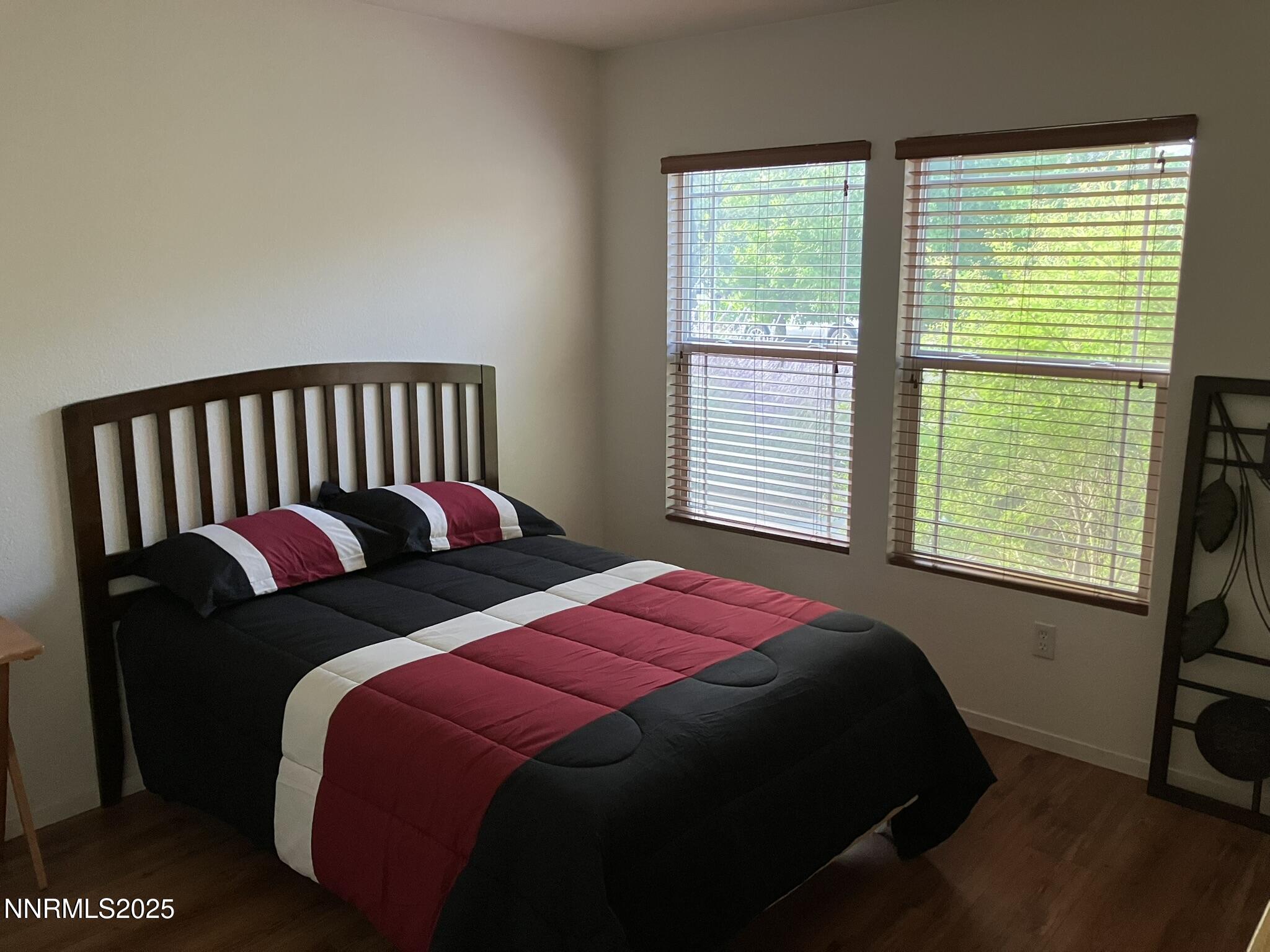 7794 Welsh Drive Reno, NV 89506 - Photo 17 of 26 a bedroom with two beds and a window