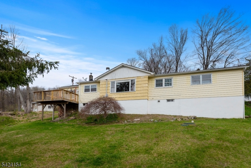 41 Swartswood Road Newton, NJ 07860 - Photo 19 of 22 a front view of a house with a garden