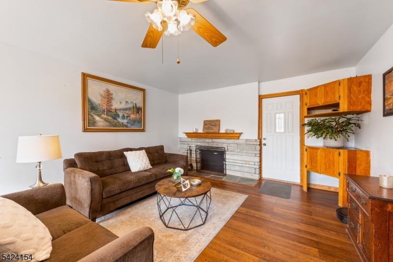 41 Swartswood Road Newton, NJ 07860 - Photo 2 of 22 a living room with furniture a rug and a chandelier