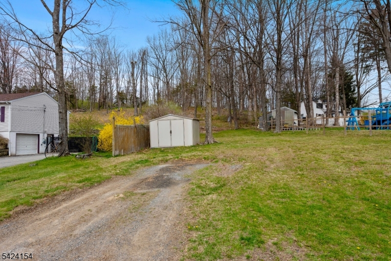 41 Swartswood Road Newton, NJ 07860 - Photo 21 of 22 a backyard of a house with lots of green space