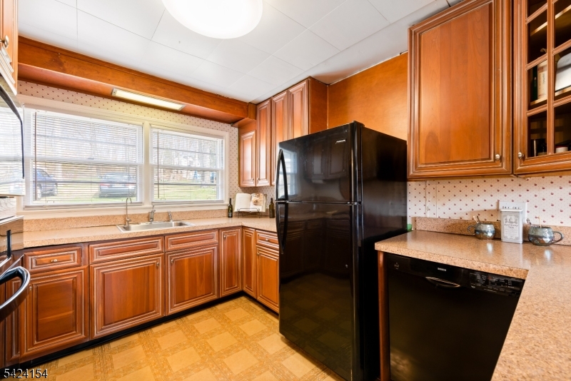 41 Swartswood Road Newton, NJ 07860 - Photo 5 of 22 a kitchen with stainless steel appliances granite countertop a refrigerator and a sink