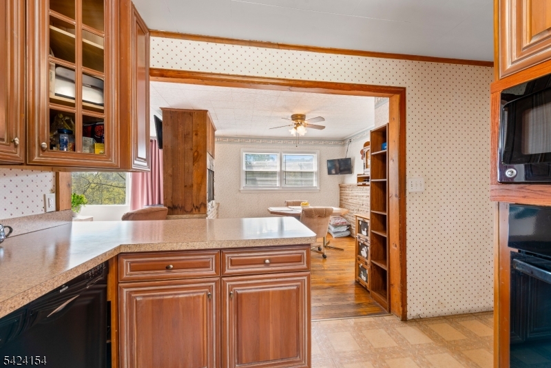41 Swartswood Road Newton, NJ 07860 - Photo 7 of 22 a kitchen with stainless steel appliances granite countertop a sink and a refrigerator