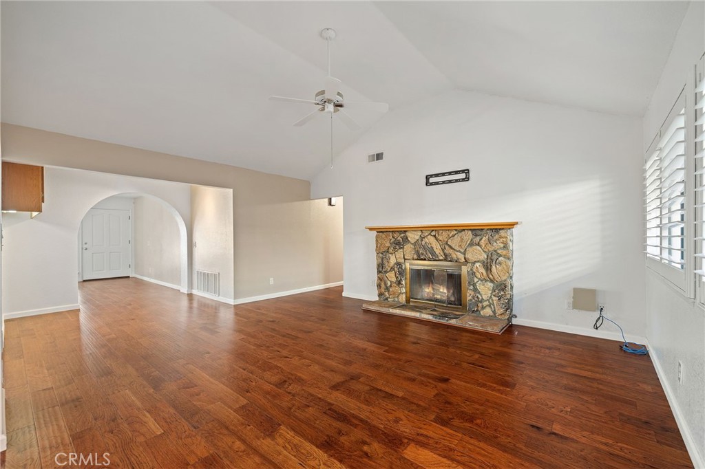 11030 Vicksburg Court Rancho Cucamonga, CA 91737 - Photo 13 of 53 a view of an empty room with window and wooden floor