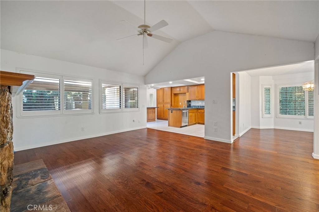 11030 Vicksburg Court Rancho Cucamonga, CA 91737 - Photo 15 of 53 a view of an empty room with a window and wooden floor